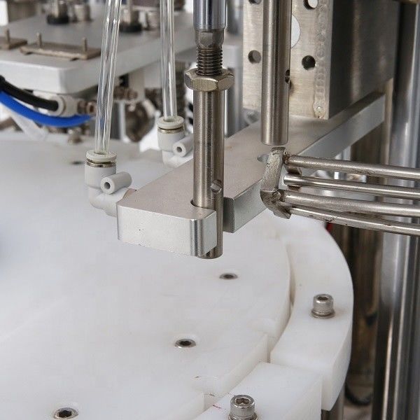 Linea di macchina multifunzionale per riempimento e rivestimento di siringhe in gel con componenti motore