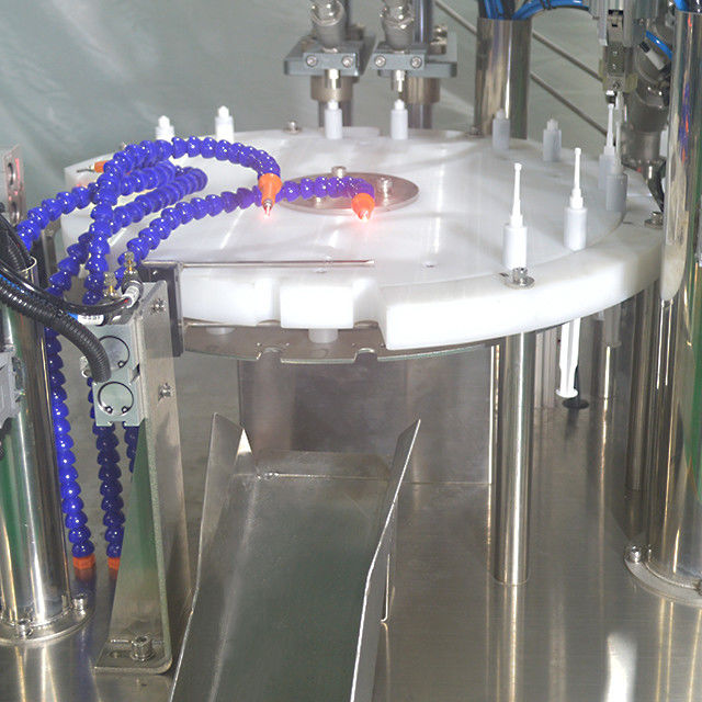Macchina di riempimento pneumatica a due teste e di copertura a vite per gel di olio liquido a piccole dosi da 10 ml