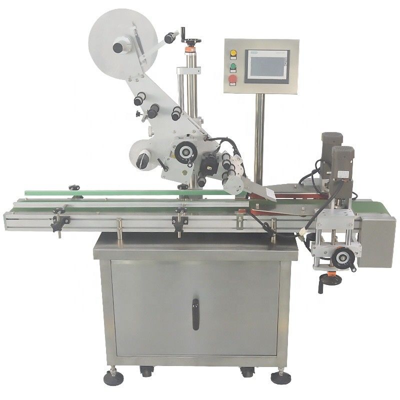 Macchina automatica per l'etichettatura di superfici piane per bottiglie rotonde