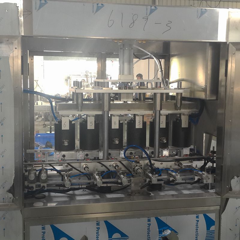 Imballaggio in plastica Macchina automatica ad alta velocità per tappi a vuoto per barattoli di vetro da 6 teste