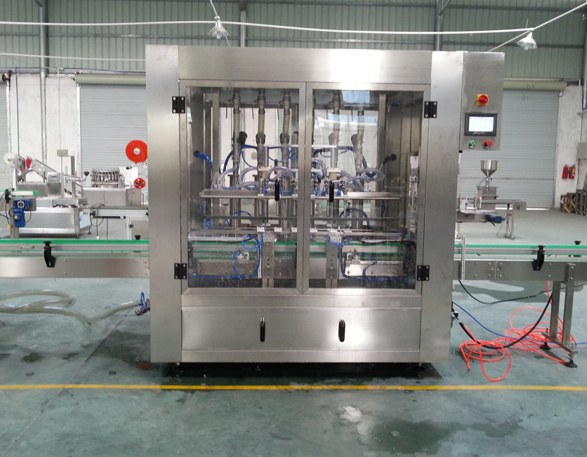 Apparecchiatura di riempimento automatico a servo pistone per bottiglie/barattoli di plastica