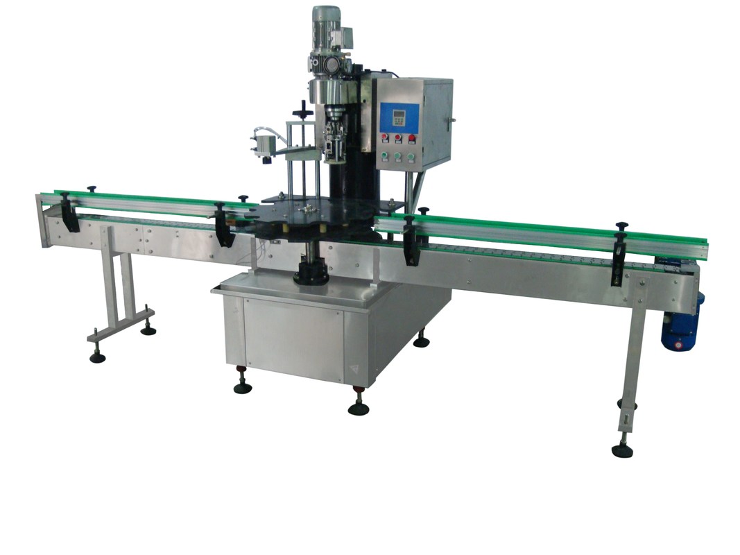 Fabbricazione di apparecchiature di chiusura automatiche per bottiglie/vaso di vetro azionate elettricamente