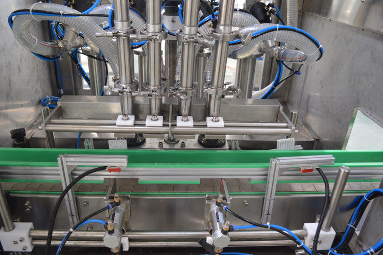 Macchina di riempimento a pistoni caldi automatico a 4 teste per il programma di controllo del riempimento con gel/cera per capelli