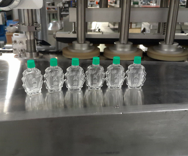 Macchina di copertura di bottiglie di vetro di piccola capacità per olio essenziale e copertura di olio medicato