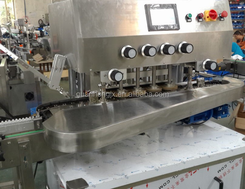 Macchine automatiche ad alta velocità per copertura di bottiglie di plastica per la produzione