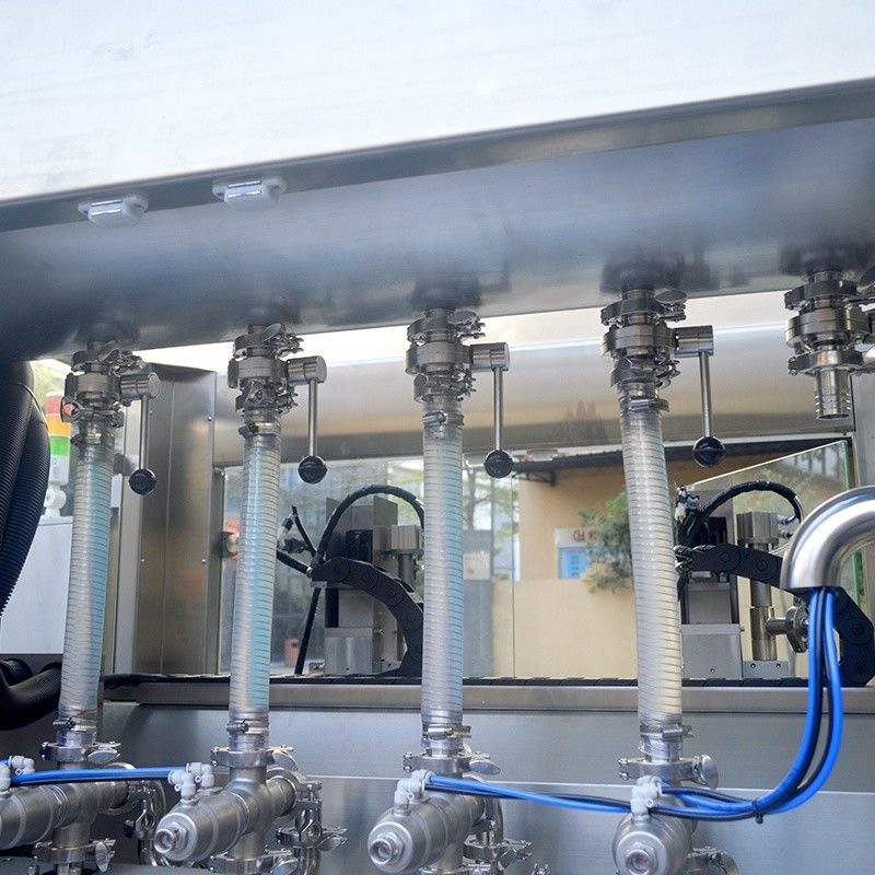 Macchina di riempimento di olio lubrificante e shampoo liquido con doppia testa di tracciamento