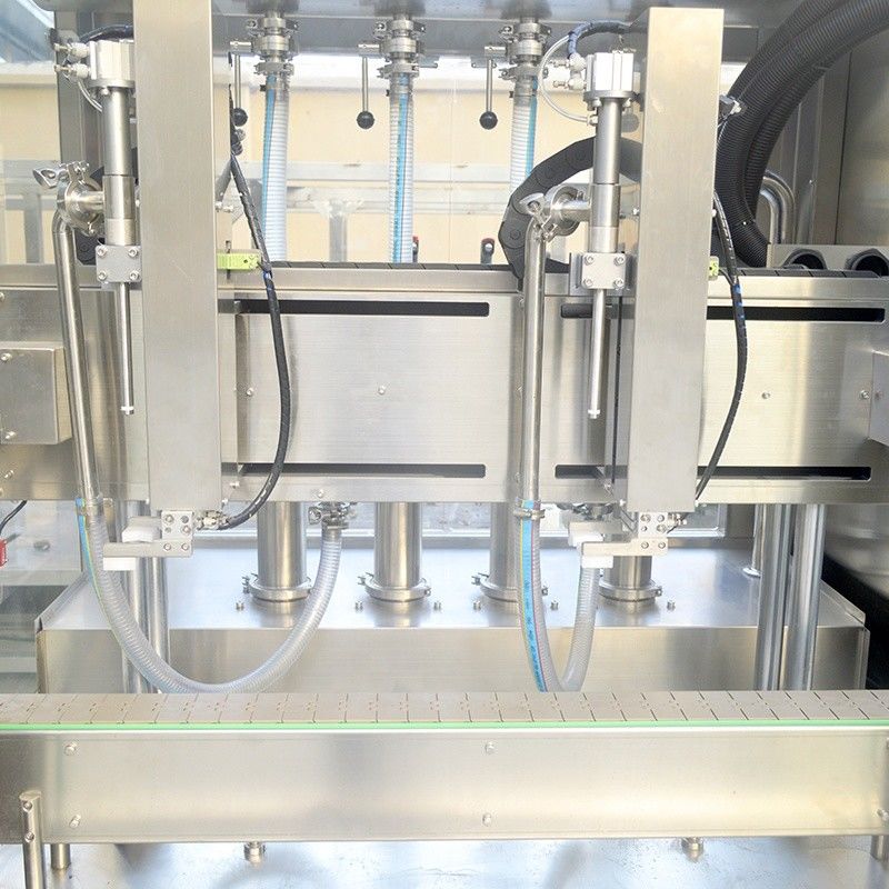 Macchina di riempimento di olio lubrificante e shampoo liquido con doppia testa di tracciamento